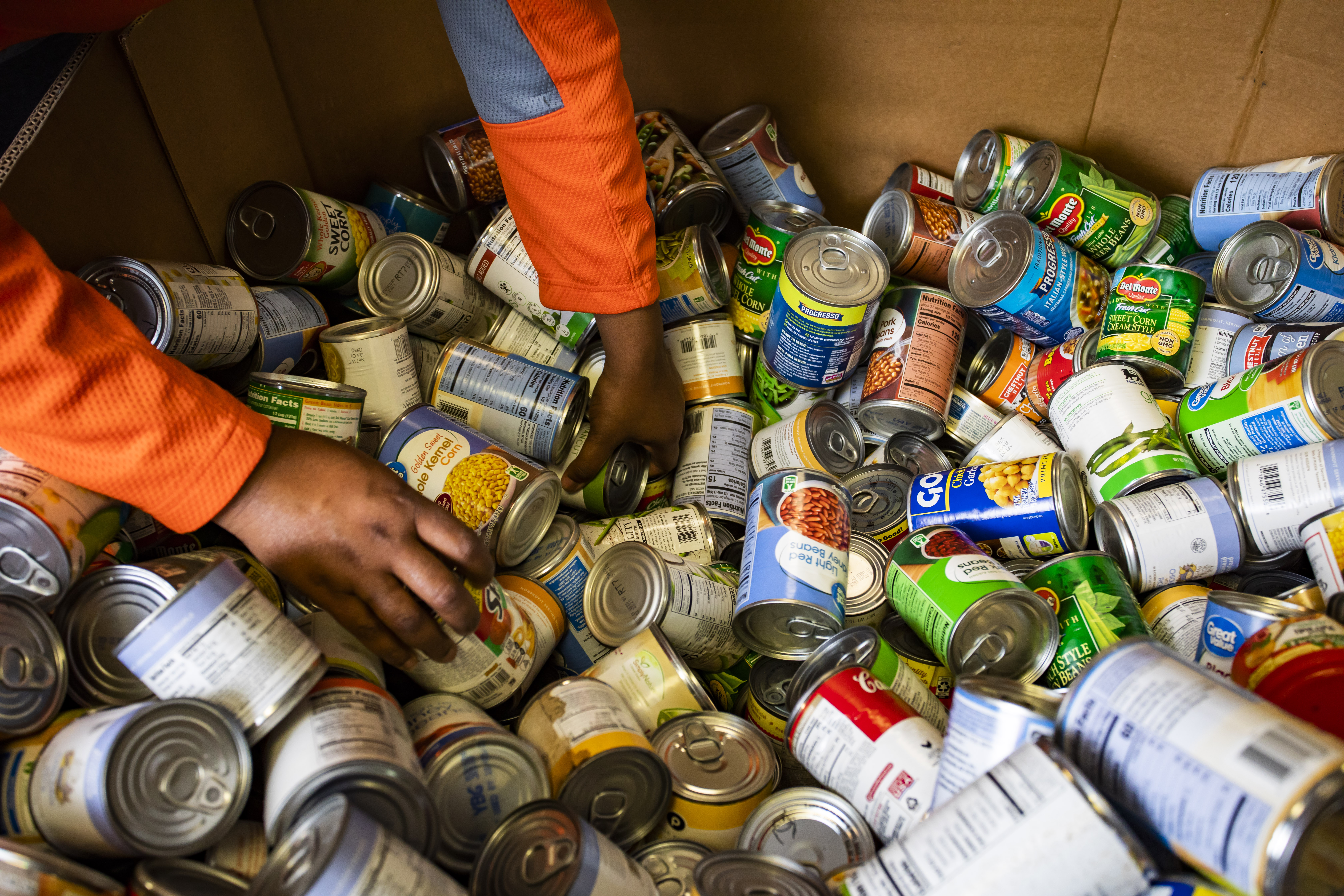 Box full of donated canned goods